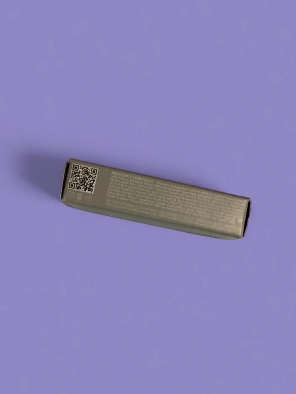 R.E.M. Beauty Plumping Iridescent Purple Lip Gloss in shade Chuckie